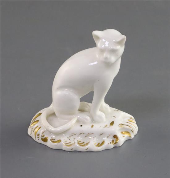 A rare Rockingham porcelain figure of a seated cat, c.1826,